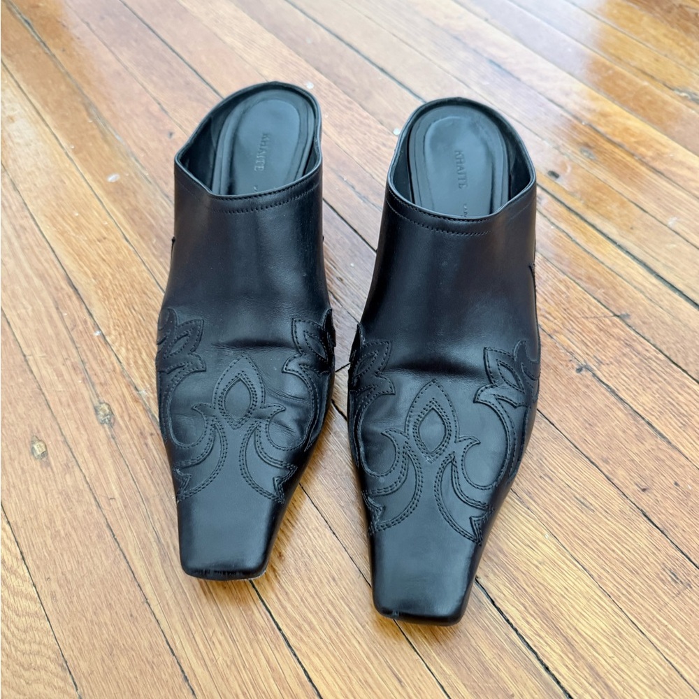 KHAITE Black Leather Square-Toe Mules with Embroidered Detail